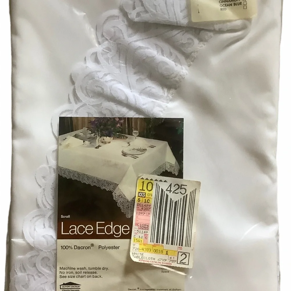 Vintage JC Penney oval tablecloth white with lace edges 67x90”